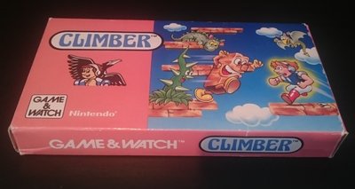 Boîte du Game & Watch Climber, illustration rose et bleue montrant le personnage grimpant une forteresse