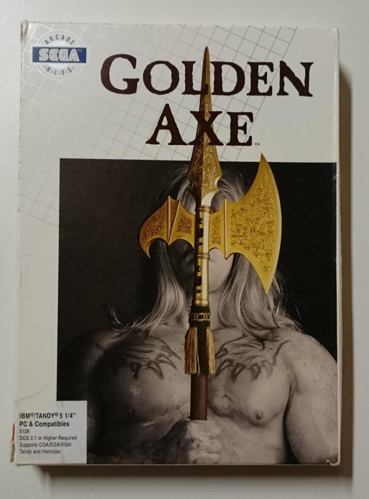 Boîte de la version PC (IBM/Tandy) de Golden Axe, avec sa jaquette illustrée d'une hache dorée
