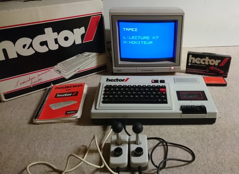 Ordinateur Hector avec écran, boîte d'origine, manuel Parlons Basic et manettes de jeu